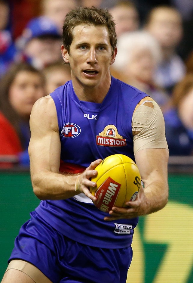 AFL 2015 Rd 17 - Western Bulldogs v Collingwood MELBOURNE, AUSTRALIA - JULY 26: Dale Morris of the Bulldogs in action during the 2015 AFL round 17 match between the Western Bulldogs and the Collingwood Magpies at Etihad Stadium, Melbourne, Australia on July 26, 2015. (Photo by Adam Trafford/AFL Media)